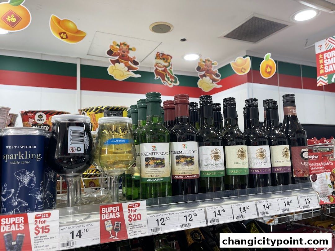 A shelf in a 7-Eleven store displaying various bottles of wine and sparkling wine.