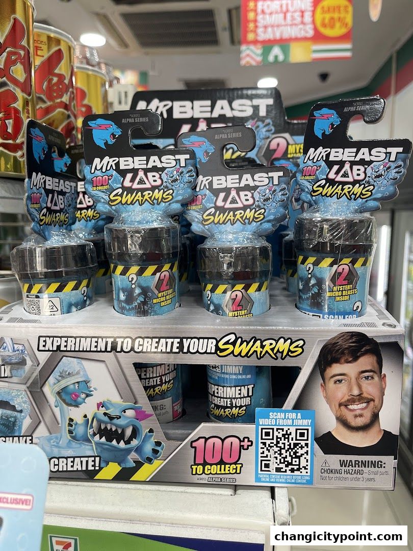Display of MrBeast Lab Swarms toys with MrBeast's image and a QR code.
