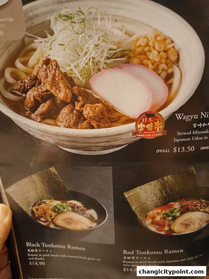 A menu featuring Wagyu beef udon, Black Tonkotsu Ramen, and Red Tonkotsu Ramen.