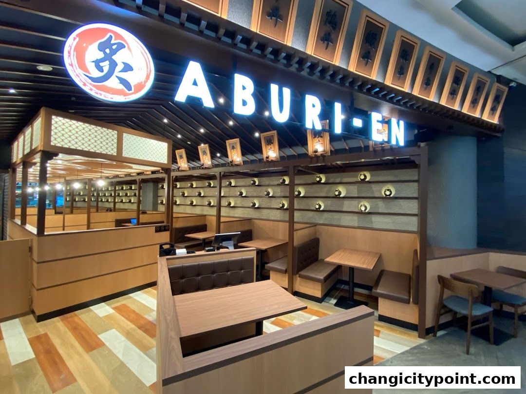 The interior of Aburi-EN Changi City Point, showcasing its modern Japanese dining ambiance.