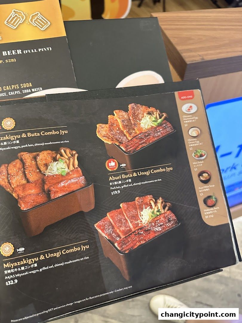 A menu from Aburi-EN Changi City Point showcasing various combo jyu dishes.