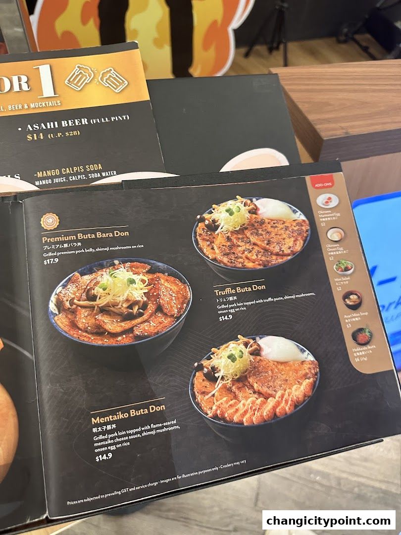 A menu from Aburi-EN Changi City Point featuring various Buta Bara Don dishes.