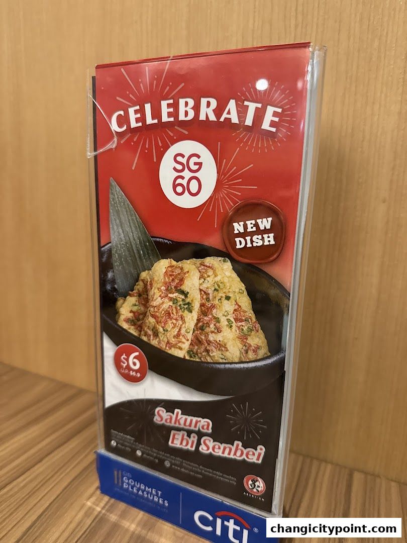 A promotional display for Sakura Ebi Senbei at Aburi-EN, celebrating SG60.