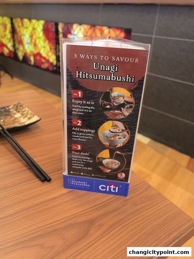 A menu detailing three ways to enjoy Unagi Hitsumabushi at Aburi-EN.