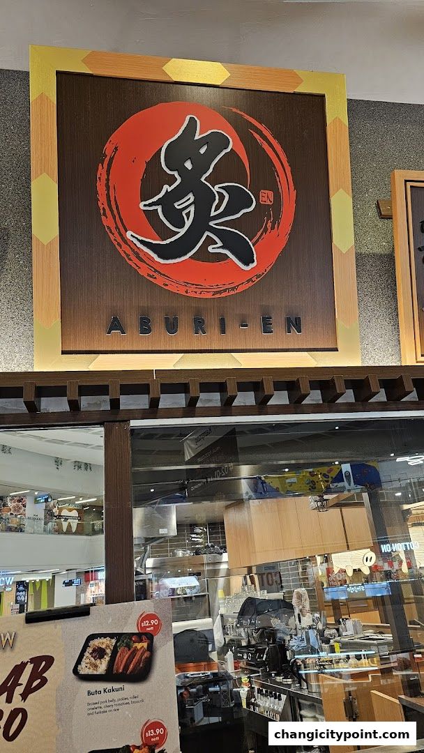 The Aburi-EN Changi City Point shop sign with Japanese calligraphy and menu items visible.