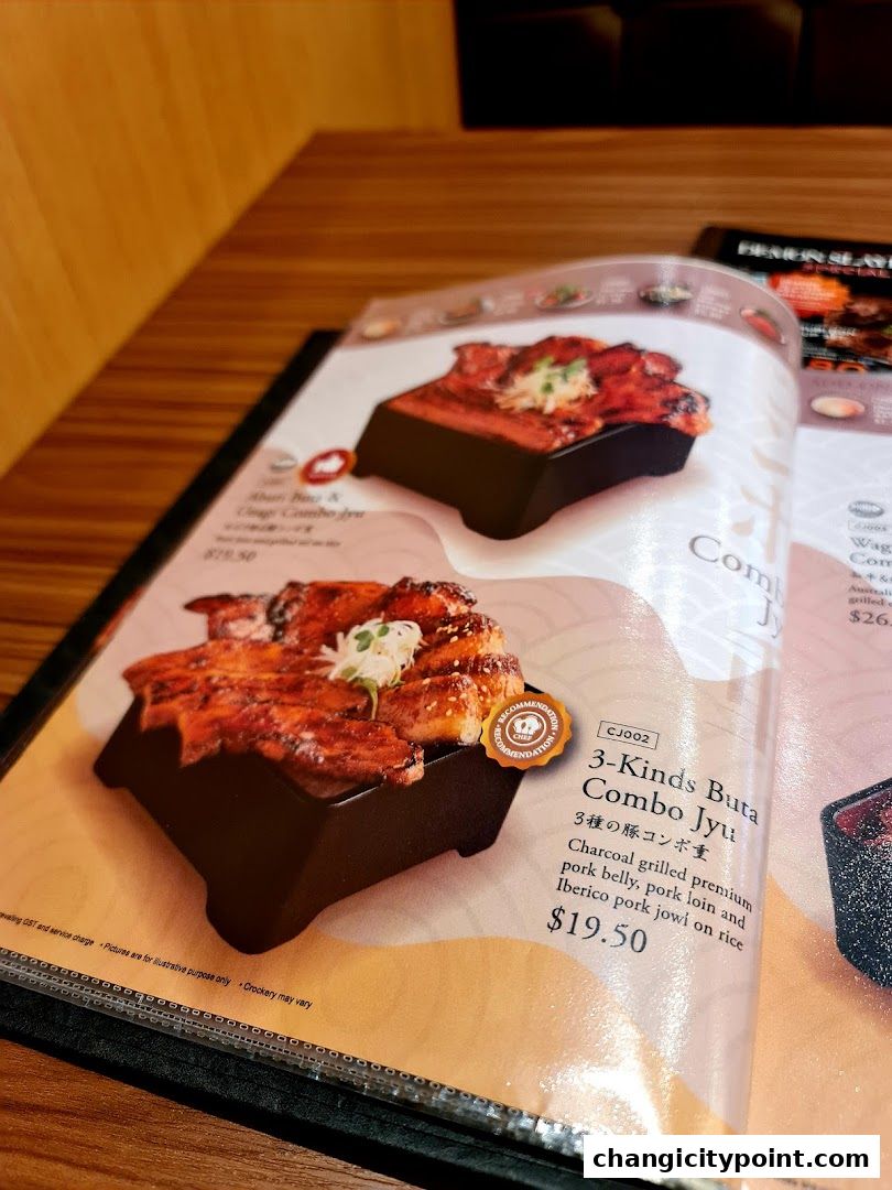 A menu page showcasing a charcoal grilled premium pork combo with rice.