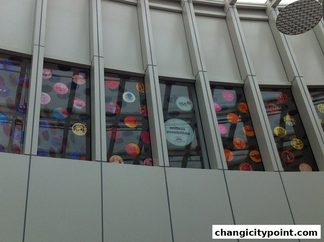 Shop windows decorated with colorful circular artwork and promotional stickers.