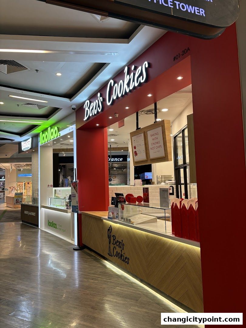 The exterior of Ben's Cookies shop with its signature red and wood design.