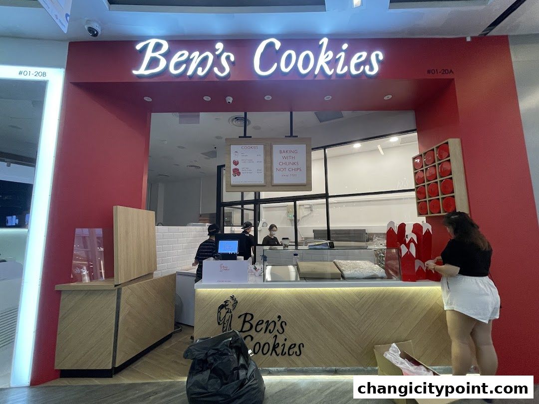 The exterior of Ben's Cookies shop with its signature red and white branding.