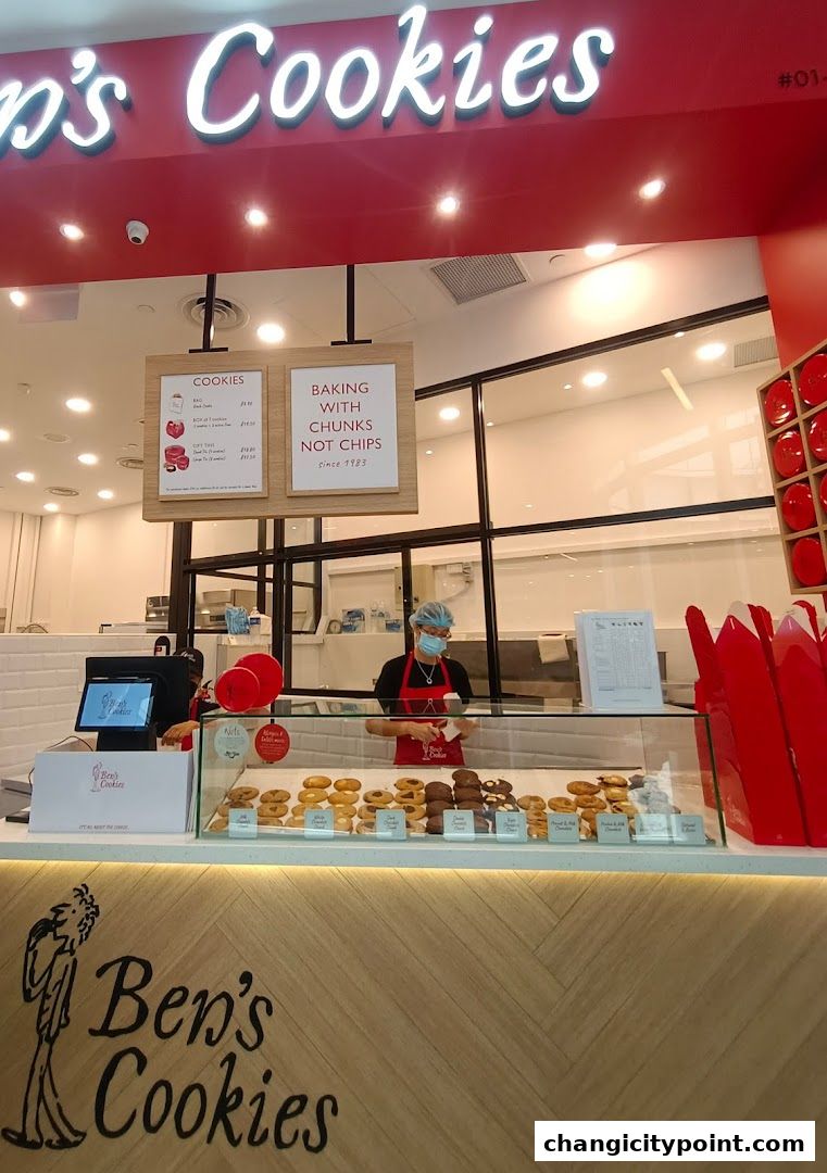 Ben's Cookies shop front with a display of freshly baked cookies and a menu board.