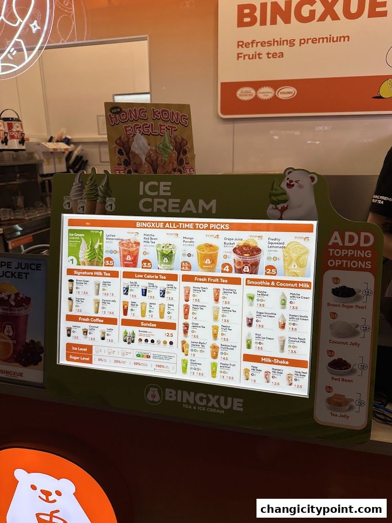 A digital menu board displaying BingXue's ice cream and tea offerings with prices.