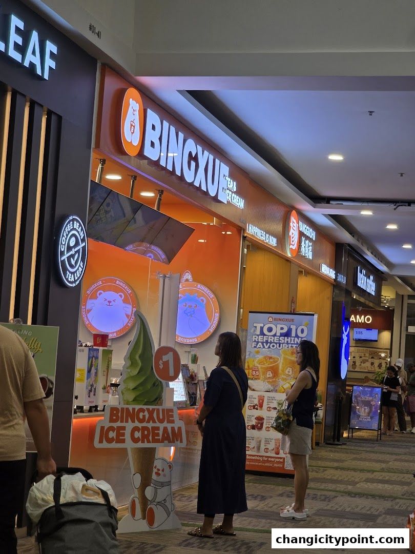 BingXue Tea & Ice Cream shop front with colorful signage and ice cream display.