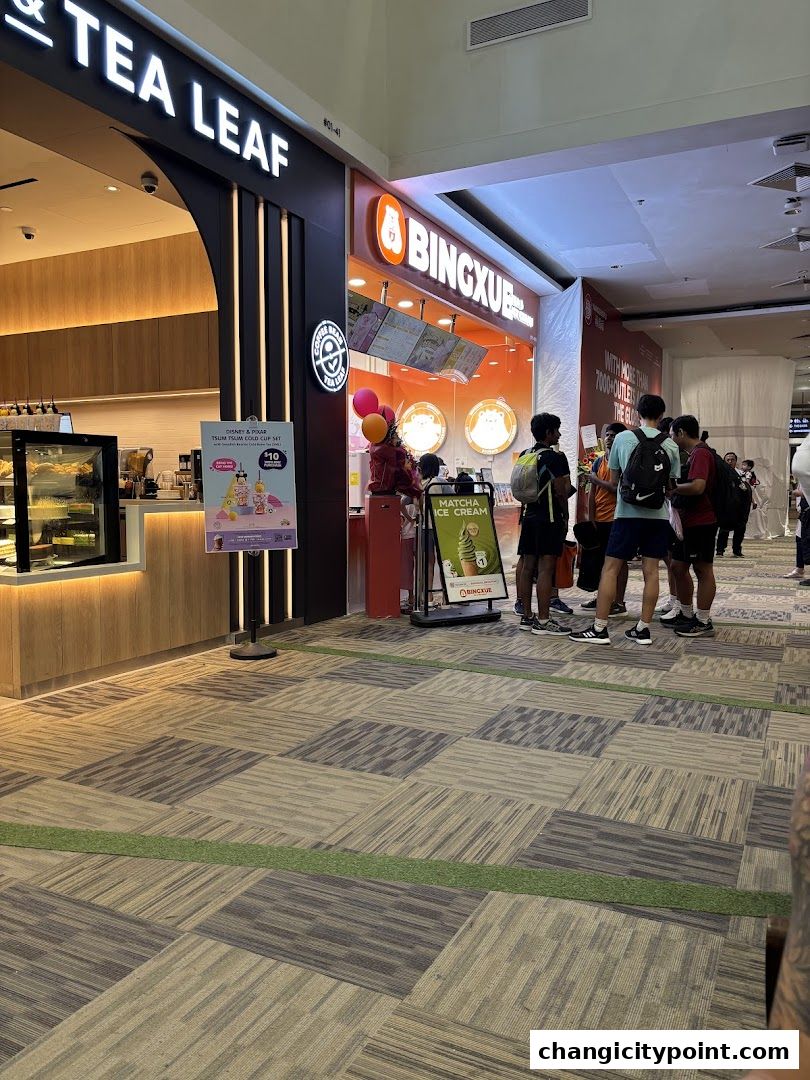 The exterior of BingXue Tea Ice Cream and The Coffee Bean & Tea Leaf shops.