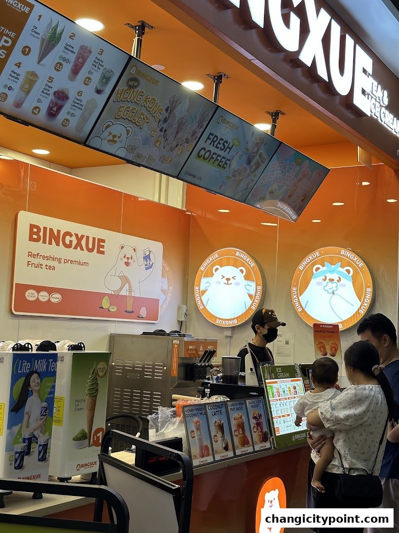 BingXue Tea & Ice Cream shop with digital menus and a counter service.