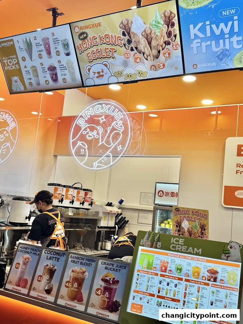 BingXue Tea & Ice Cream shop with colorful drinks and egglets displayed.