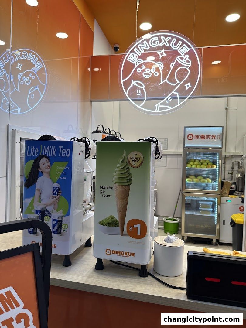 BingXue Tea & Ice Cream shop counter with milk tea and matcha ice cream displays.