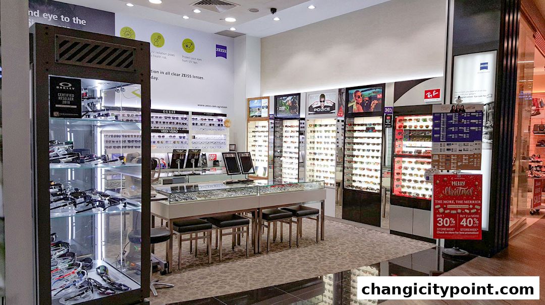 Interior view of Capitol Optical Changi City Point, showcasing a wide selection of eyewear and promotional displays.