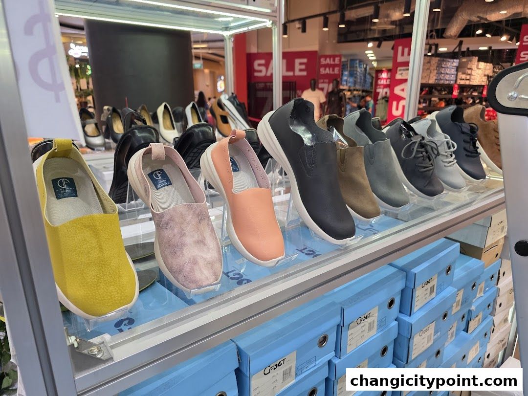 A display of various comfortable slip-on shoes in different colors and styles.