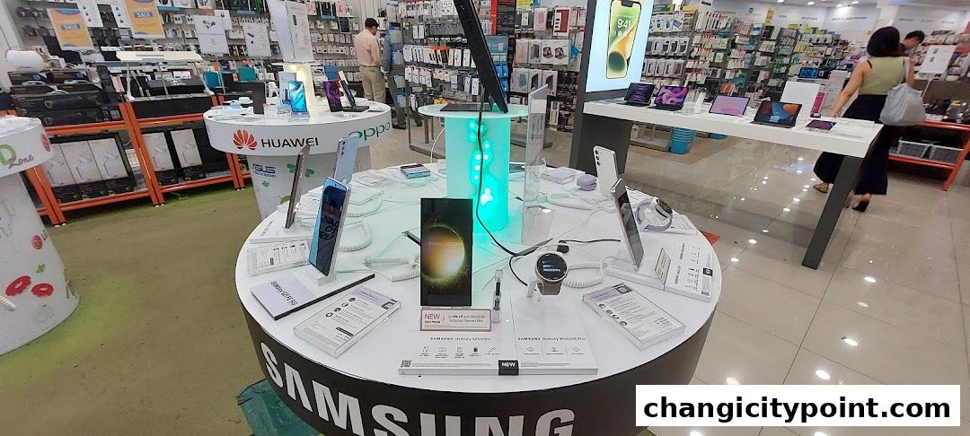 Interior view of a Challenger electronics store showcasing various mobile phones and accessories.