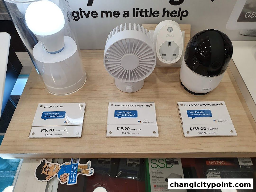 Smart home devices including a smart bulb, fan, smart plug, and IP camera are displayed.