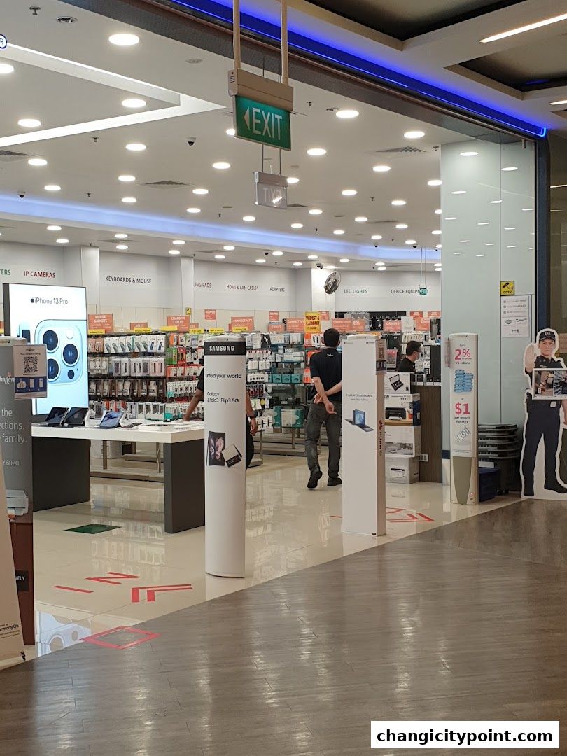 Interior view of Challenger electronics store with various gadgets and displays.