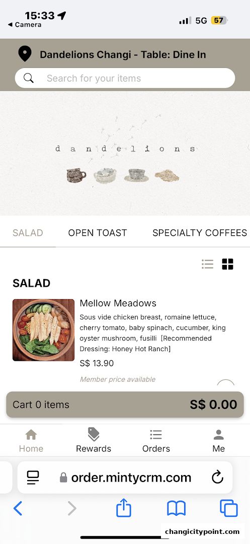 A screenshot of the Dandelions restaurant menu, featuring a salad item.