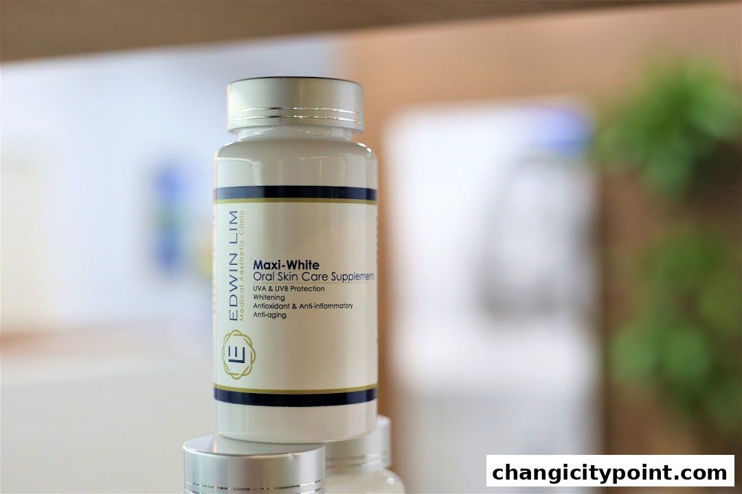 A bottle of Maxi-White Oral Skin Care Supplement from Edwin Lim Medical Aesthetic Clinic.