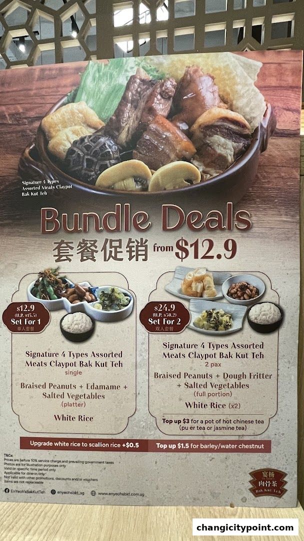 A menu board showcasing bundle deals for Bak Kut Teh with various side dishes and rice.