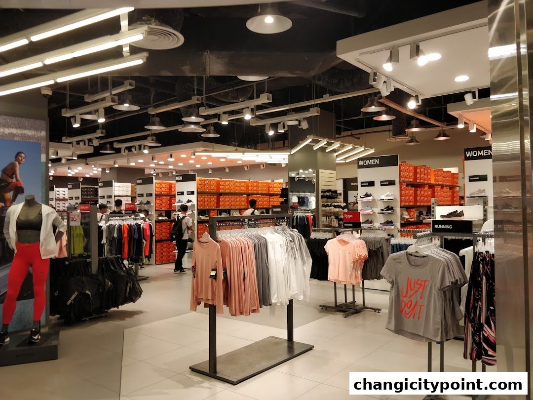 Interior view of a G2000 store showcasing apparel and footwear for men and women.