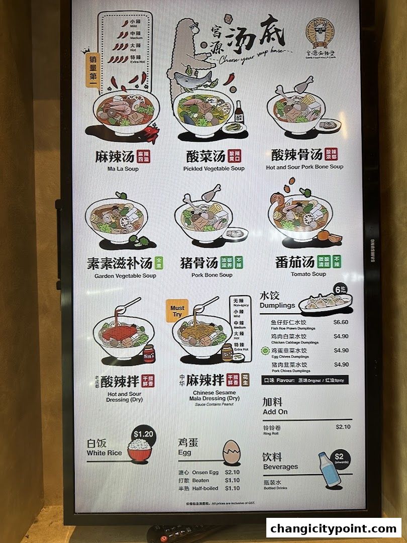 A digital menu board displaying various soup bases, dumplings, add-ons, and beverages.