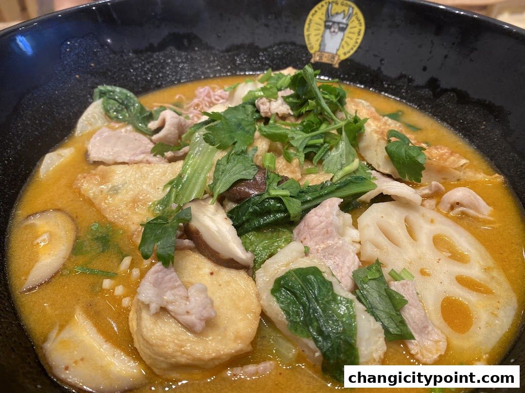 A close-up of a steaming bowl of Mala Tang with various ingredients.
