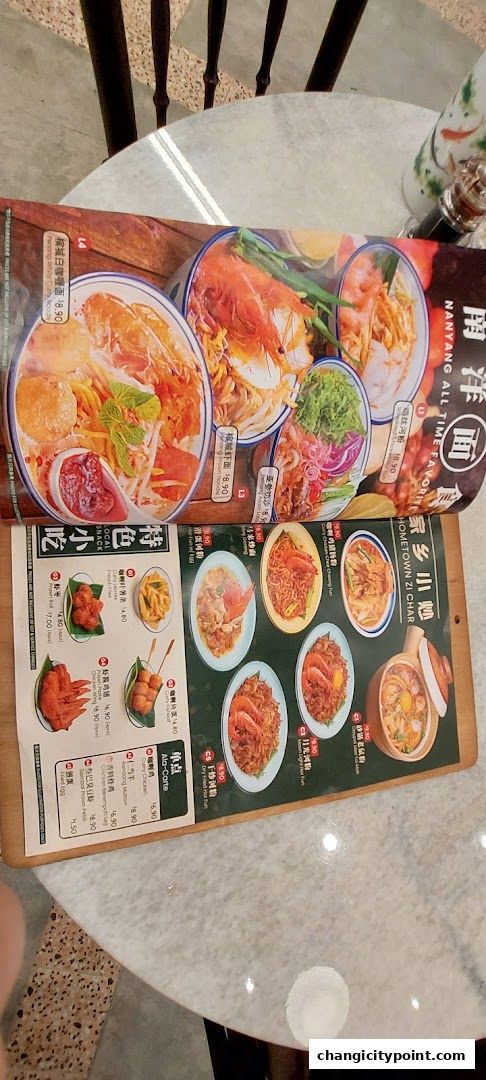 A menu from Great Nanyang Heritage Cafe featuring noodle dishes and local snacks.