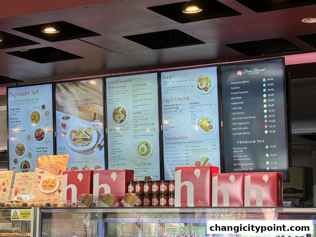 A digital menu board displaying food and drink options at Hans Cafe.