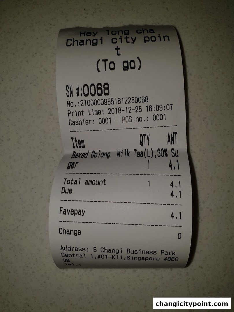 A receipt from Hey Long Cha showing a "Baked Oolong Milk Tea" purchase.