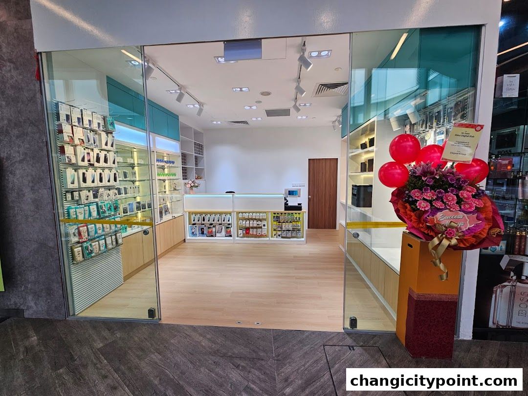 The entrance of Hitec Digital Hub, a modern electronics store with displays of phones and accessories.