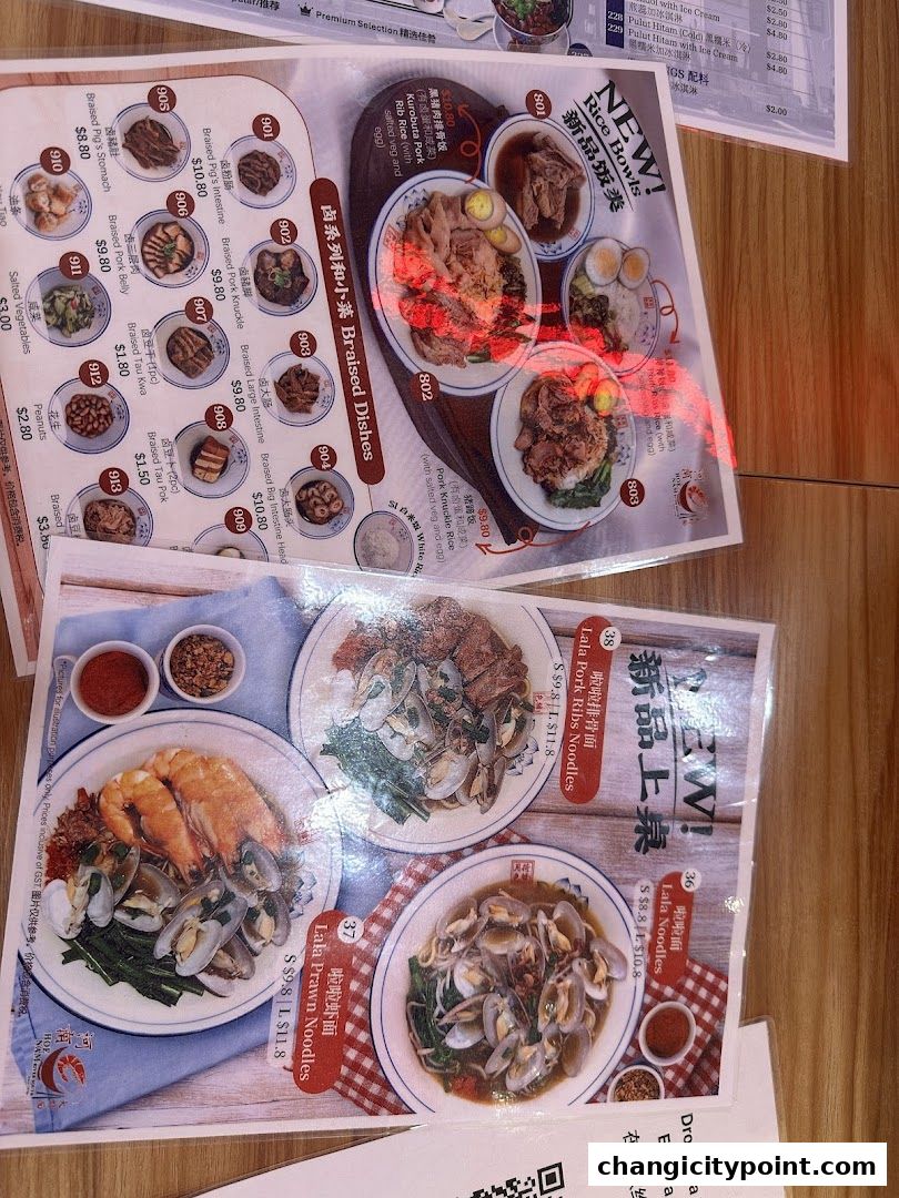 A menu from Hoe Nam River South Prawn Noodles featuring braised dishes and noodle options.