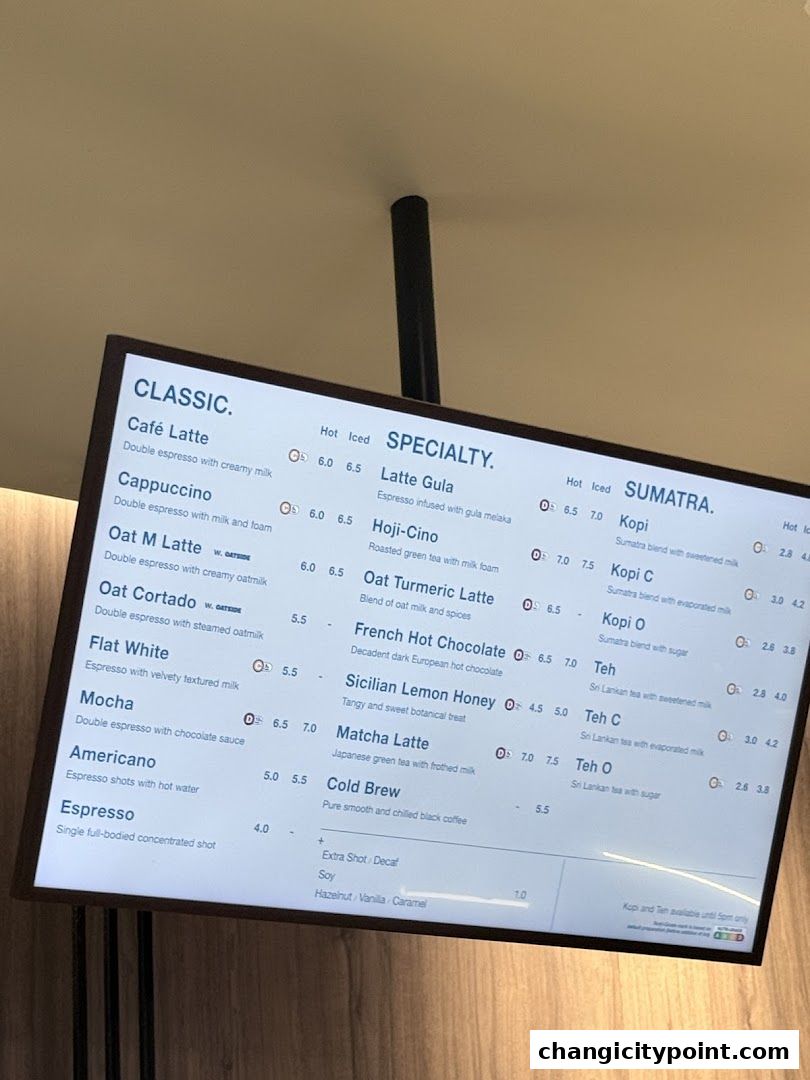 A digital menu board displaying classic, specialty, and Sumatra coffee drinks with prices.