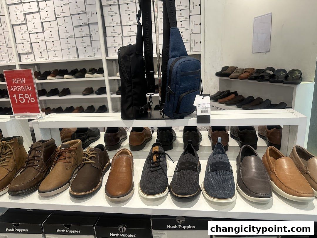 Hush Puppies store interior showcasing a wide selection of shoes and bags.
