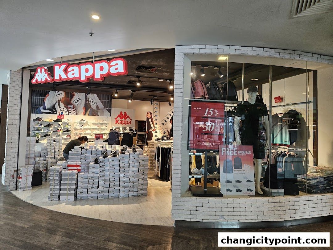 Kappa store entrance showcasing shoes, apparel, and a sale on backpacks.