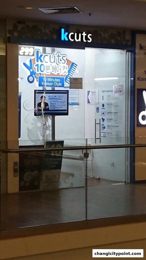 The storefront of Kcuts, a hair salon offering 10-minute Korean style haircuts.