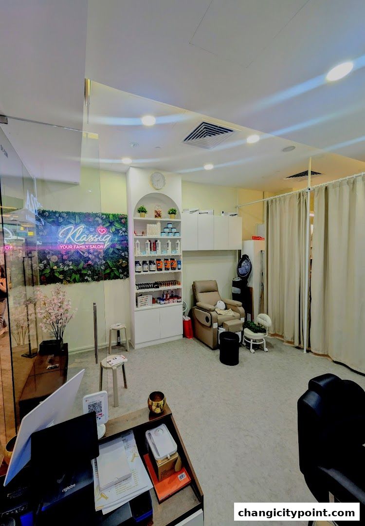 Interior view of Klassiq Family Salon, showcasing a reception area and treatment space.
