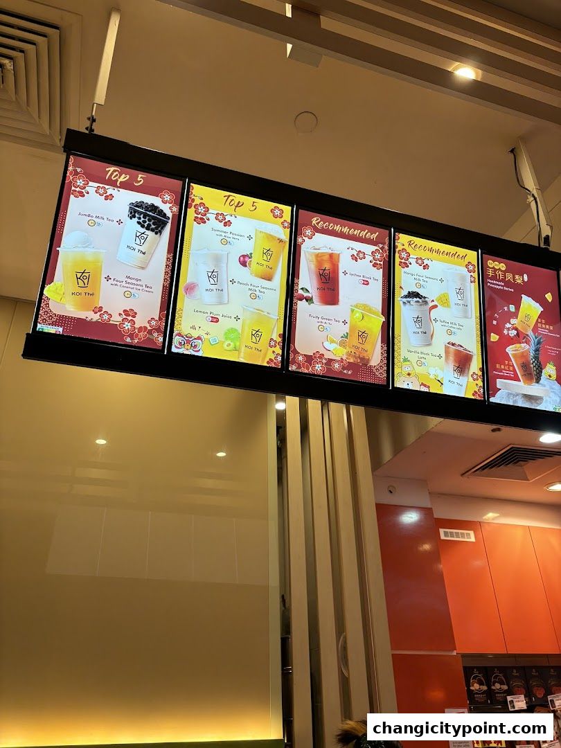 Digital menu boards displaying popular and recommended bubble tea drinks from KOI The.