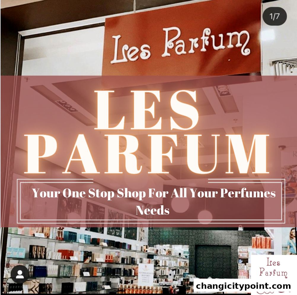 The exterior of Les Parfum, a shop specializing in perfumes, with shelves of fragrances visible.