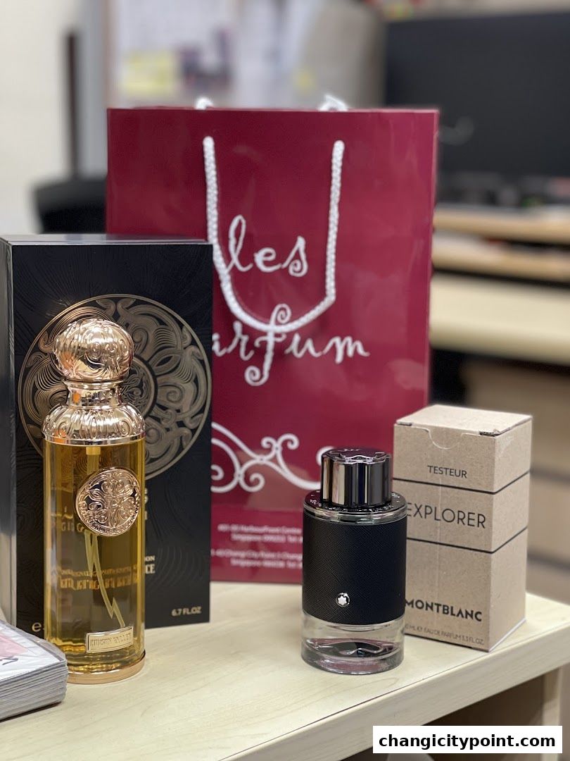 A display of luxury perfumes from Les Parfum, featuring elegant bottles and branded packaging.