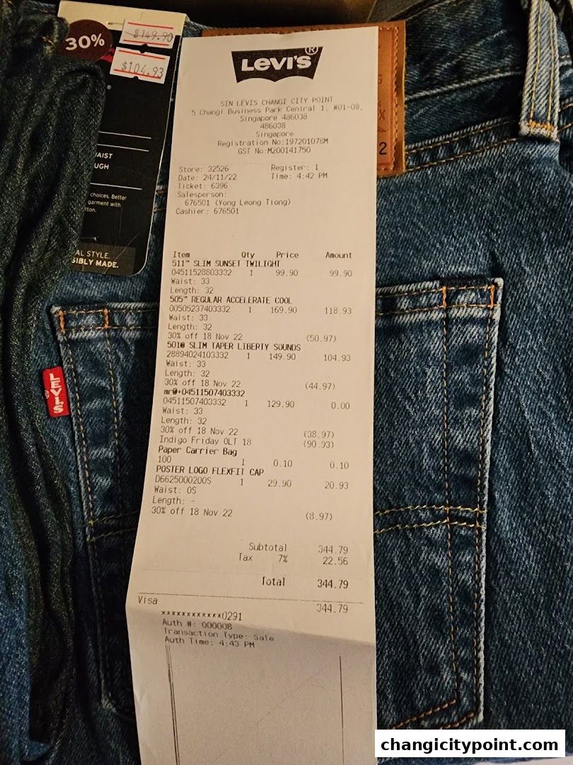 A receipt from Levi's Outlet Changi City Point showing purchased items and prices.