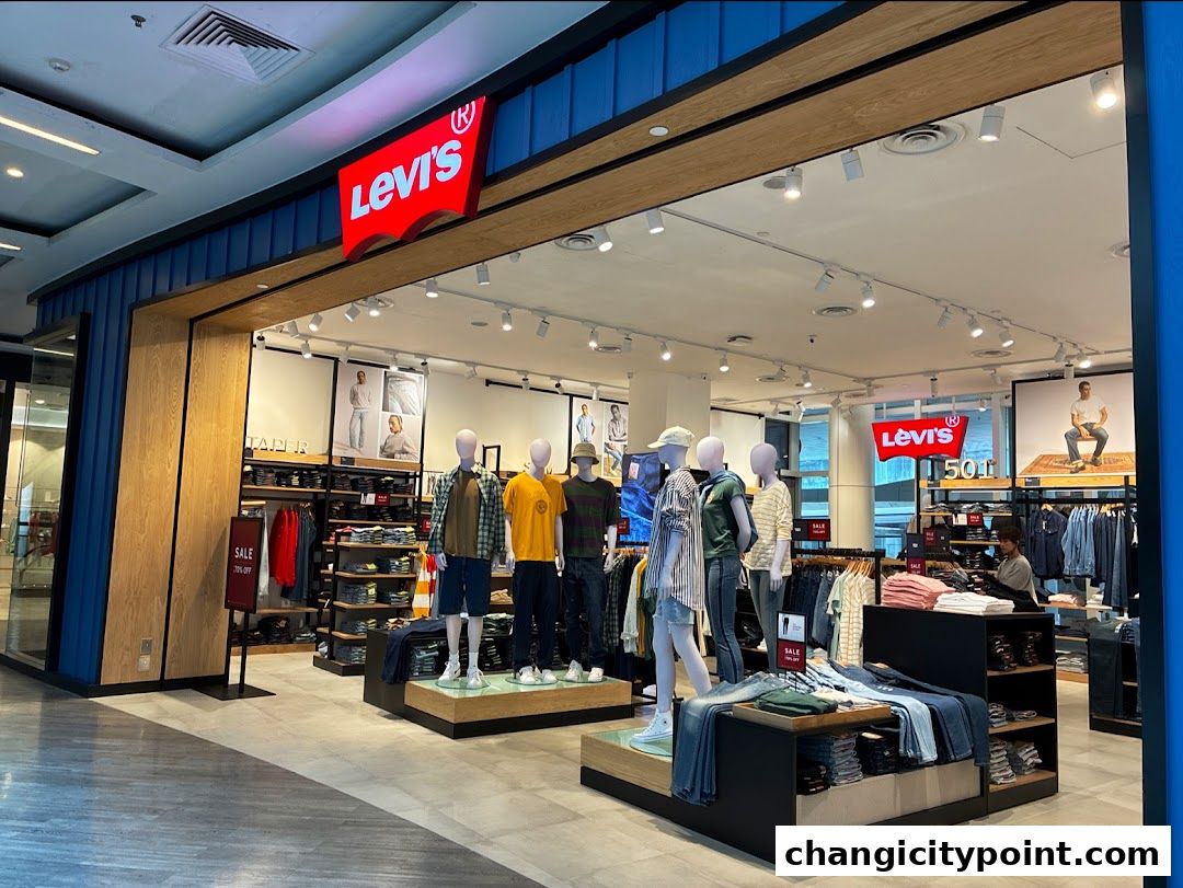 Levi's Outlet store entrance with mannequins displaying jeans and apparel.