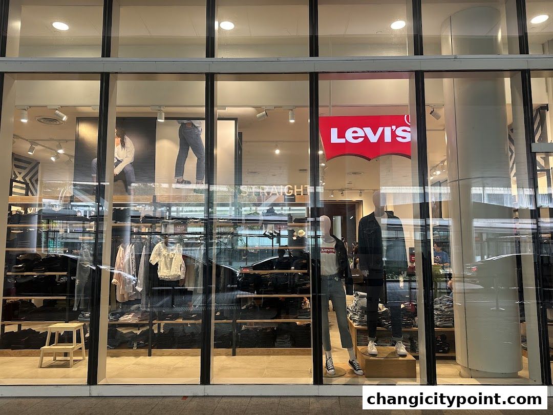 Levi's Outlet store front with mannequins and clothing displays visible through the windows.