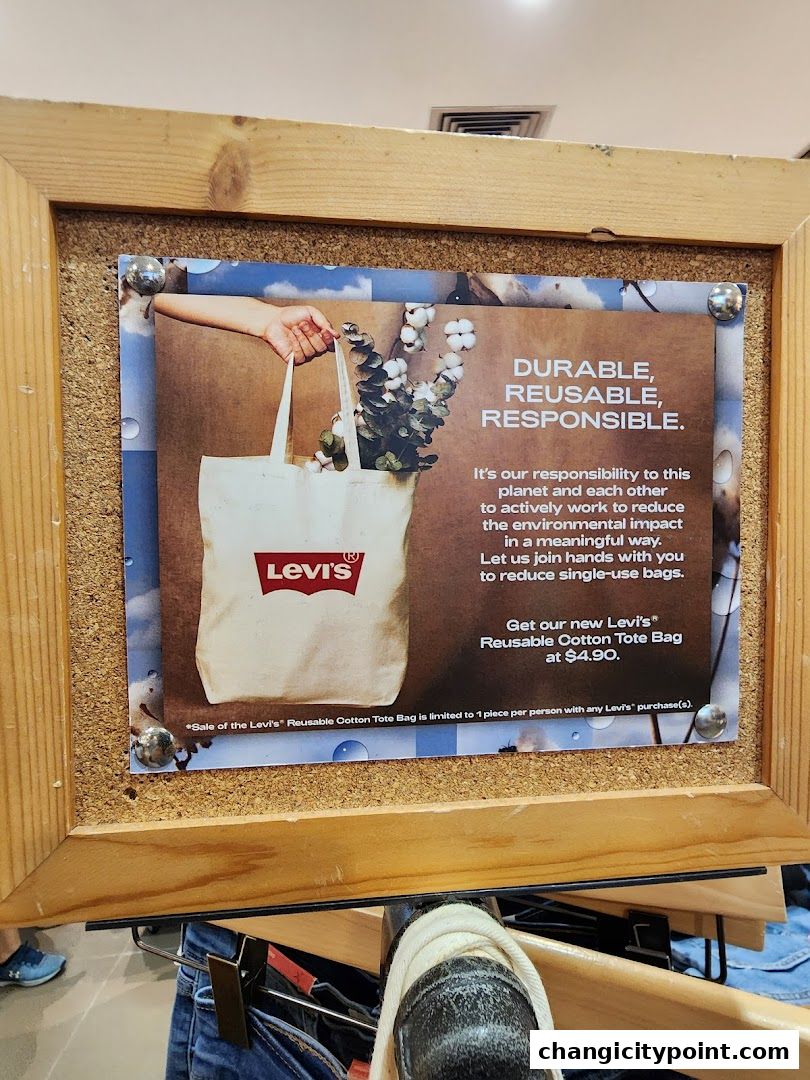A sign promoting Levi's reusable cotton tote bags for $4.90.