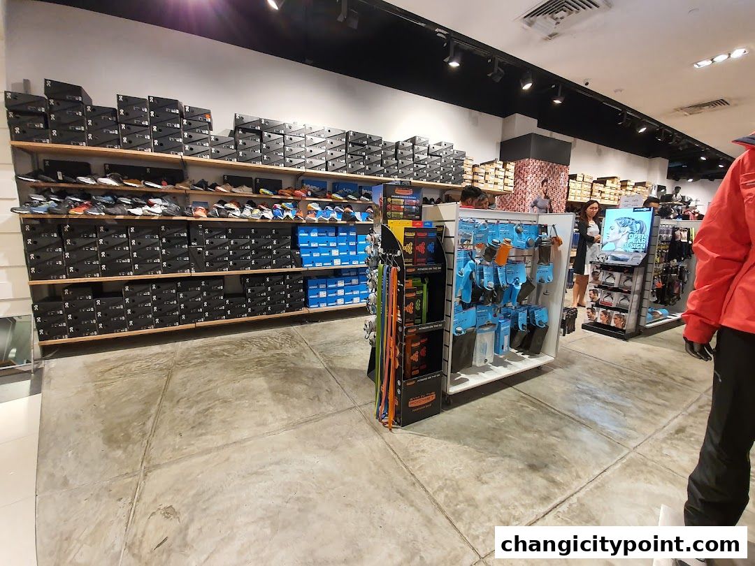 Interior view of a retail store selling athletic shoes and accessories.