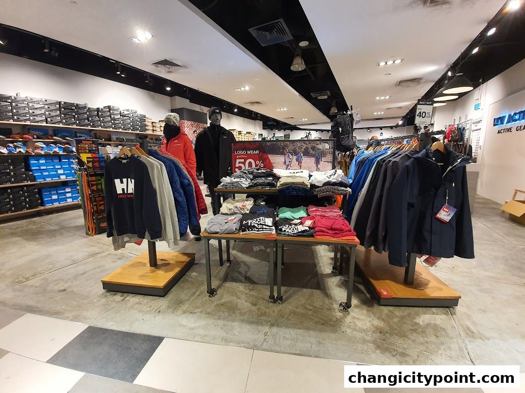 Interior view of Liv Activ Changi City Point store showcasing apparel and footwear.